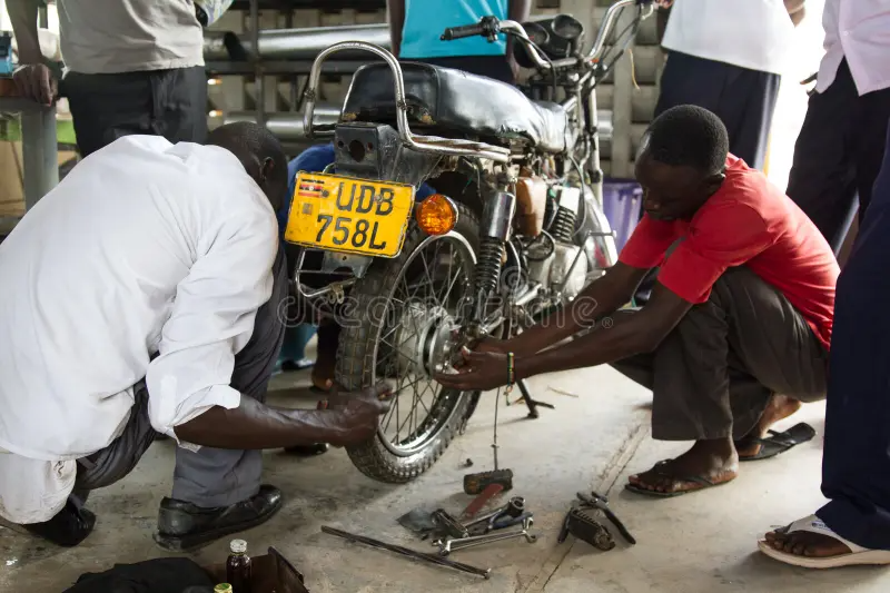 imgi_167_vocational-training-africa-students-learning-auto-mechanics-technical-school-uganda-46897469